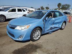 Salvage cars for sale from Copart San Diego, CA: 2012 Toyota Camry Hybrid