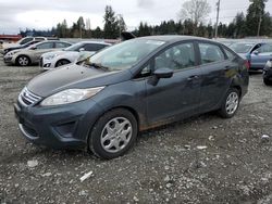 Salvage cars for sale from Copart Graham, WA: 2011 Ford Fiesta SE