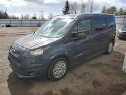 Salvage cars for sale at Bowmanville, ON auction: 2014 Ford Transit Connect XLT