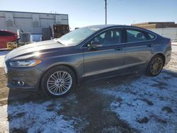 Salvage cars for sale from Copart Bismarck, ND: 2016 Ford Fusion SE