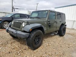 Salvage cars for sale from Copart Grand Prairie, TX: 2015 Jeep Wrangler Unlimited Sport