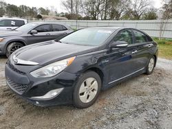 Vehiculos salvage en venta de Copart Fairburn, GA: 2012 Hyundai Sonata Hybrid