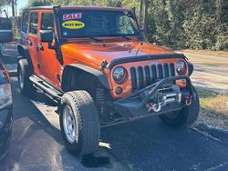 Jeep salvage cars for sale: 2010 Jeep Wrangler Unlimited Sport