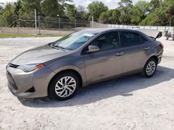 Salvage cars for sale from Copart Fort Pierce, FL: 2017 Toyota Corolla L