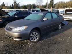 Salvage cars for sale from Copart Graham, WA: 2005 Toyota Camry LE