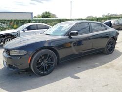 Salvage cars for sale from Copart Orlando, FL: 2016 Dodge Charger SXT