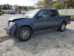 Salvage SUVs for sale at auction: 2014 Nissan Frontier S