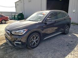 Salvage cars for sale at Jacksonville, FL auction: 2017 BMW X1 SDRIVE28I