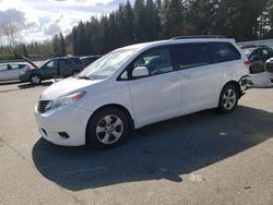 Salvage cars for sale from Copart Arlington, WA: 2014 Toyota Sienna LE