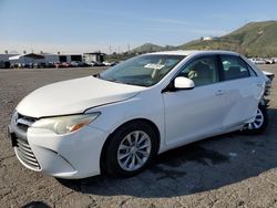 Salvage cars for sale from Copart Colton, CA: 2015 Toyota Camry Hybrid