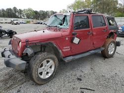 Salvage cars for sale from Copart Fairburn, GA: 2013 Jeep Wrangler Unlimited Sport