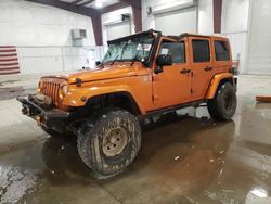 Salvage cars for sale at Avon, MN auction: 2011 Jeep Wrangler Unlimited Sahara