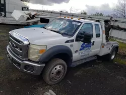 Salvage trucks for sale at Woodburn, OR auction: 2015 Ford F550 Super Duty