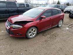 Salvage cars for sale at Lansing, MI auction: 2014 Ford Focus SE