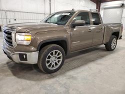 Salvage trucks for sale at Avon, MN auction: 2014 GMC Sierra K1500 SLE