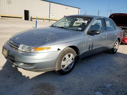 Salvage cars for sale from Copart Haslet, TX: 2002 Saturn L200