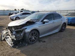 Salvage cars for sale at Bakersfield, CA auction: 2021 Toyota Camry SE