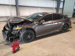 Salvage cars for sale from Copart Graham, WA: 2019 Toyota Camry Hybrid