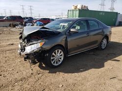 Salvage cars for sale from Copart Elgin, IL: 2012 Toyota Camry Hybrid