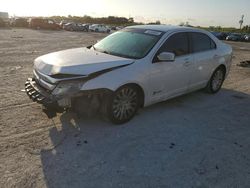 Salvage cars for sale at West Palm Beach, FL auction: 2012 Ford Fusion Hybrid