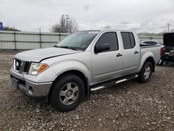 Salvage vehicles for parts for sale at auction: 2005 Nissan Frontier Crew Cab LE