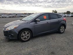 Salvage cars for sale at Antelope, CA auction: 2012 Ford Focus SEL