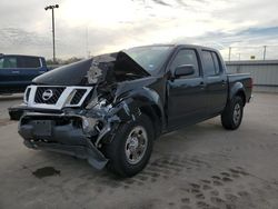 Salvage cars for sale from Copart Wilmer, TX: 2009 Nissan Frontier Crew Cab SE