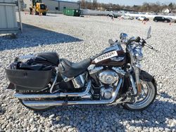 Salvage Motorcycles for sale at auction: 2011 Harley-Davidson Flstn