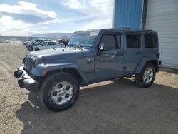 Salvage cars for sale from Copart Casper, WY: 2014 Jeep Wrangler Unlimited Sahara