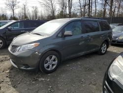 Toyota Sienna LE salvage cars for sale: 2011 Toyota Sienna LE