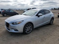 Salvage cars for sale from Copart Bakersfield, CA: 2018 Mazda 3 Touring