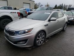Salvage cars for sale from Copart Woodburn, OR: 2011 KIA Optima SX