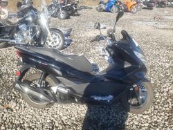 Salvage motorcycles for sale at Reno, NV auction: 2015 Honda PCX 150