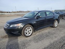 Salvage cars for sale from Copart Ontario Auction, ON: 2011 Ford Taurus SEL
