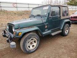 Salvage cars for sale from Copart Davison, MI: 2001 Jeep Wrangler / TJ Sahara