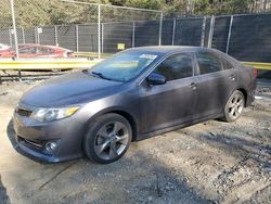 Carros dañados por inundaciones a la venta en subasta: 2014 Toyota Camry L