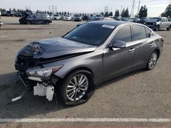 Salvage cars for sale from Copart Rancho Cucamonga, CA: 2021 Infiniti Q50 Luxe