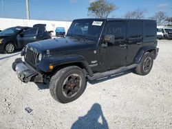 Vehiculos salvage en venta de Copart Homestead, FL: 2011 Jeep Wrangler Unlimited Sahara