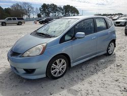 Honda salvage cars for sale: 2011 Honda FIT Sport