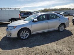 Salvage cars for sale from Copart Anderson, CA: 2014 Toyota Camry Hybrid