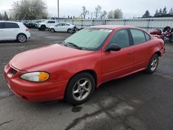 Salvage cars for sale from Copart Woodburn, OR: 2003 Pontiac Grand AM SE1