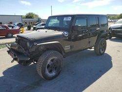 Salvage cars for sale from Copart Orlando, FL: 2017 Jeep Wrangler Unlimited Sport