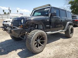 Jeep salvage cars for sale: 2012 Jeep Wrangler Unlimited Sport