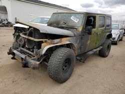 Salvage cars for sale from Copart Portland, MI: 2010 Jeep Wrangler Unlimited Sport