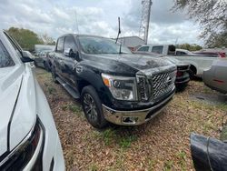 Salvage cars for sale from Copart Riverview, FL: 2017 Nissan Titan SV