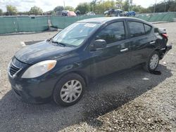 Salvage cars for sale from Copart Riverview, FL: 2013 Nissan Versa S