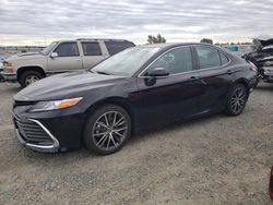 Salvage cars for sale at Antelope, CA auction: 2021 Toyota Camry XLE