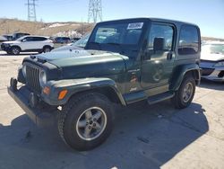 Salvage cars for sale from Copart Littleton, CO: 1997 Jeep Wrangler / TJ Sahara