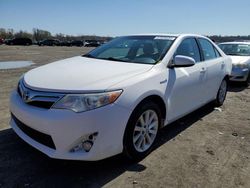 Salvage cars for sale from Copart Cahokia Heights, IL: 2012 Toyota Camry Hybrid