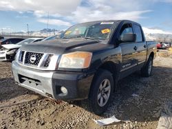 Salvage trucks for sale at Magna, UT auction: 2010 Nissan Titan XE